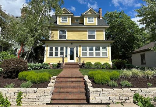 Beautiful home in a perfect location - two short blocks to Lake of the Isles and across the street from Levin Triangle Park.