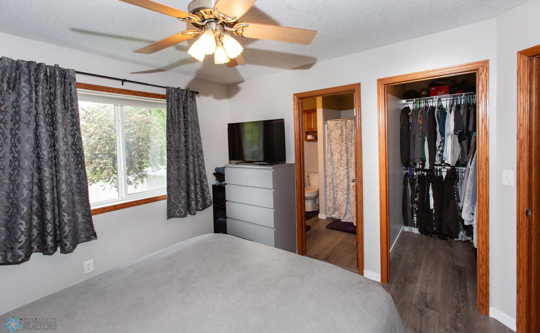 Primary Bedroom w/ walk-in closet & private bath