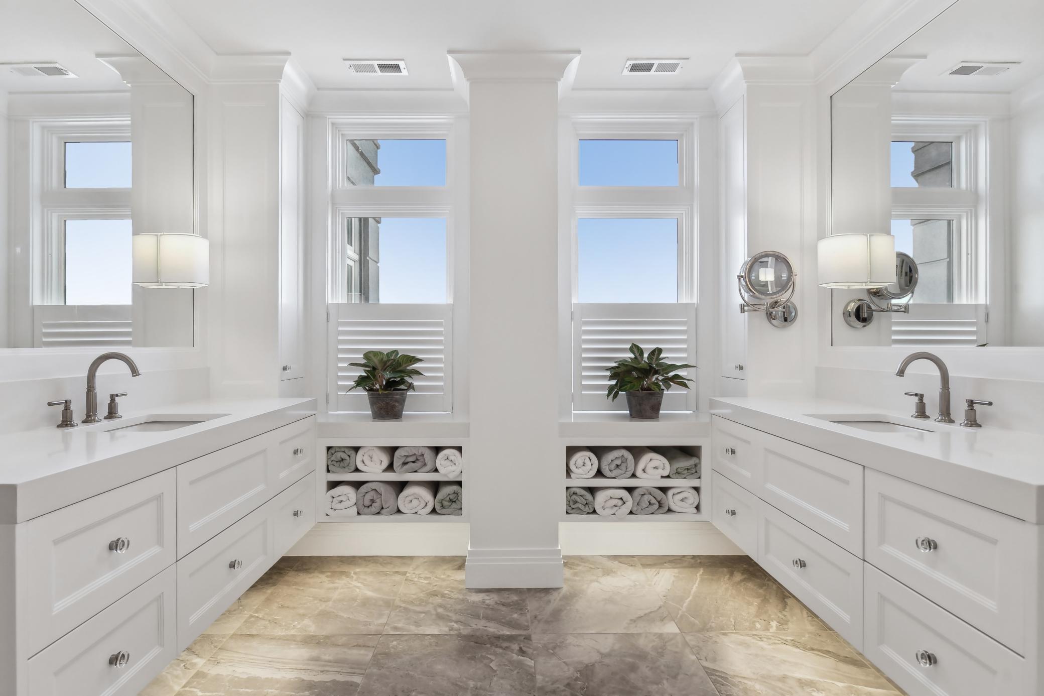 The natural stone is breathtaking! Enjoy the warmth of in-floor hearing and the convenience of double vanities.