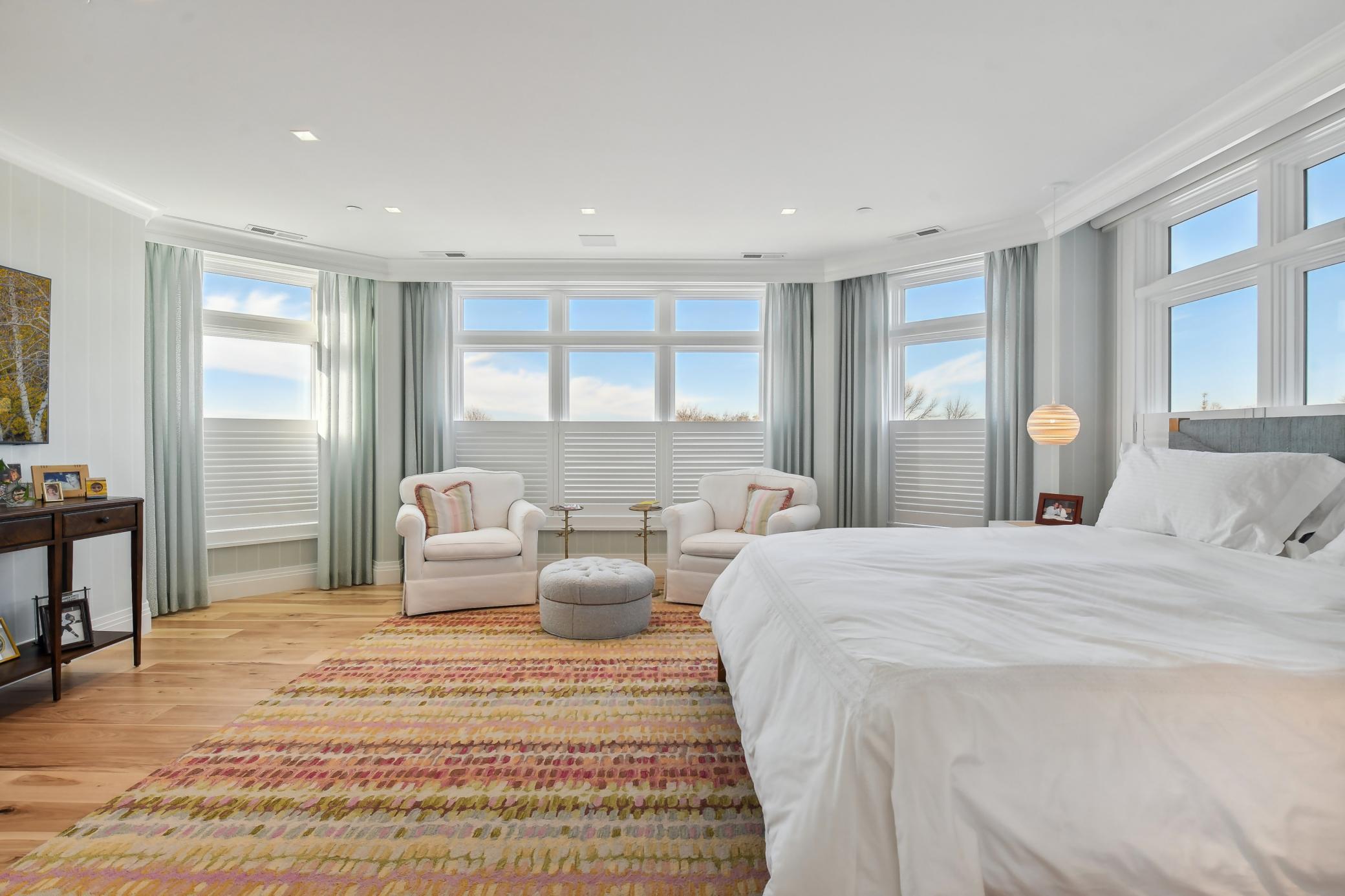 The remarkable primary bedroom offers a perfect blend of style and comfort. Consider it a peaceful retreat within your own home!