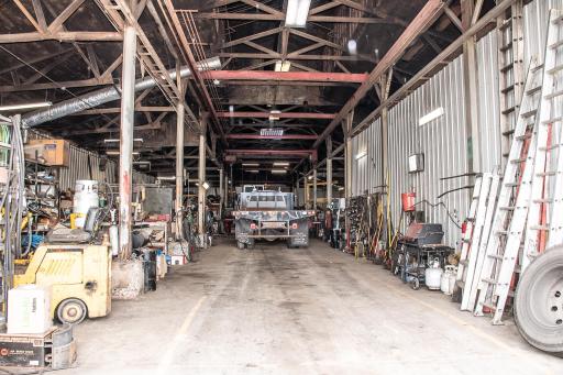 High-bay center has full length bridge crane with 14' clear picking height