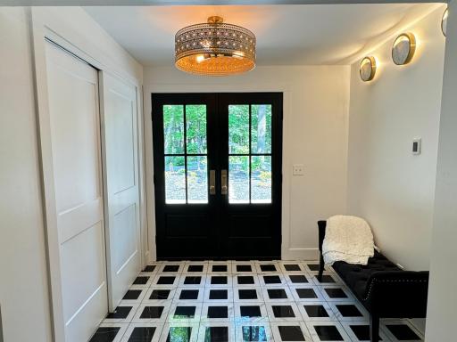 Beautiful front entry way with heated tiled floors