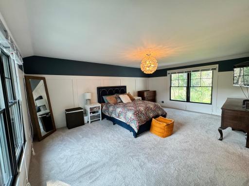 Spacious master bedroom with sweeping views on both sides. Located on the second floor.