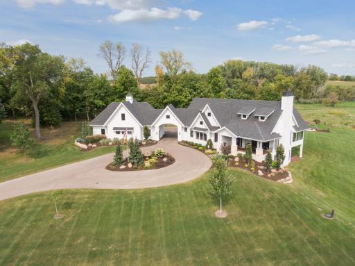 A long private driveway leads to the beautiful custom-built home at the end of the cul-de-sac. 