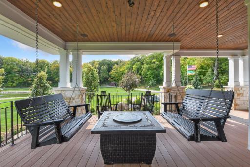 Enjoy the views of the pond and acreage from the front porch swings.