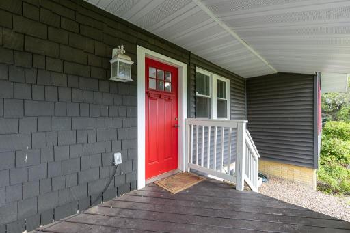 A change in siding adds character to the front porch - exterior doors were replaced in 2019