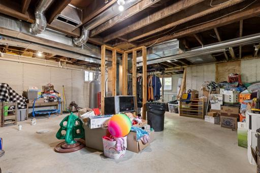 The full basement is ready for finishing touches if you're looking to add some living space! Beamed for 2 additional bedrooms, space for a family room, and drains for a full bathroom!