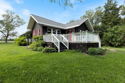 Two sets of stairs provide easy access to the back deck