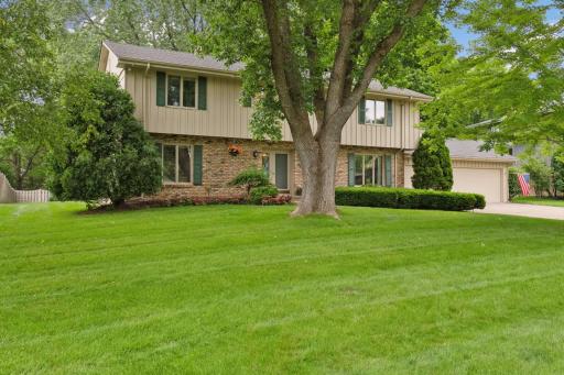 Lovely center hall two story located in the Parkwood Knolls neighborhood of Edina! Fabulous treed yard beautify the home.