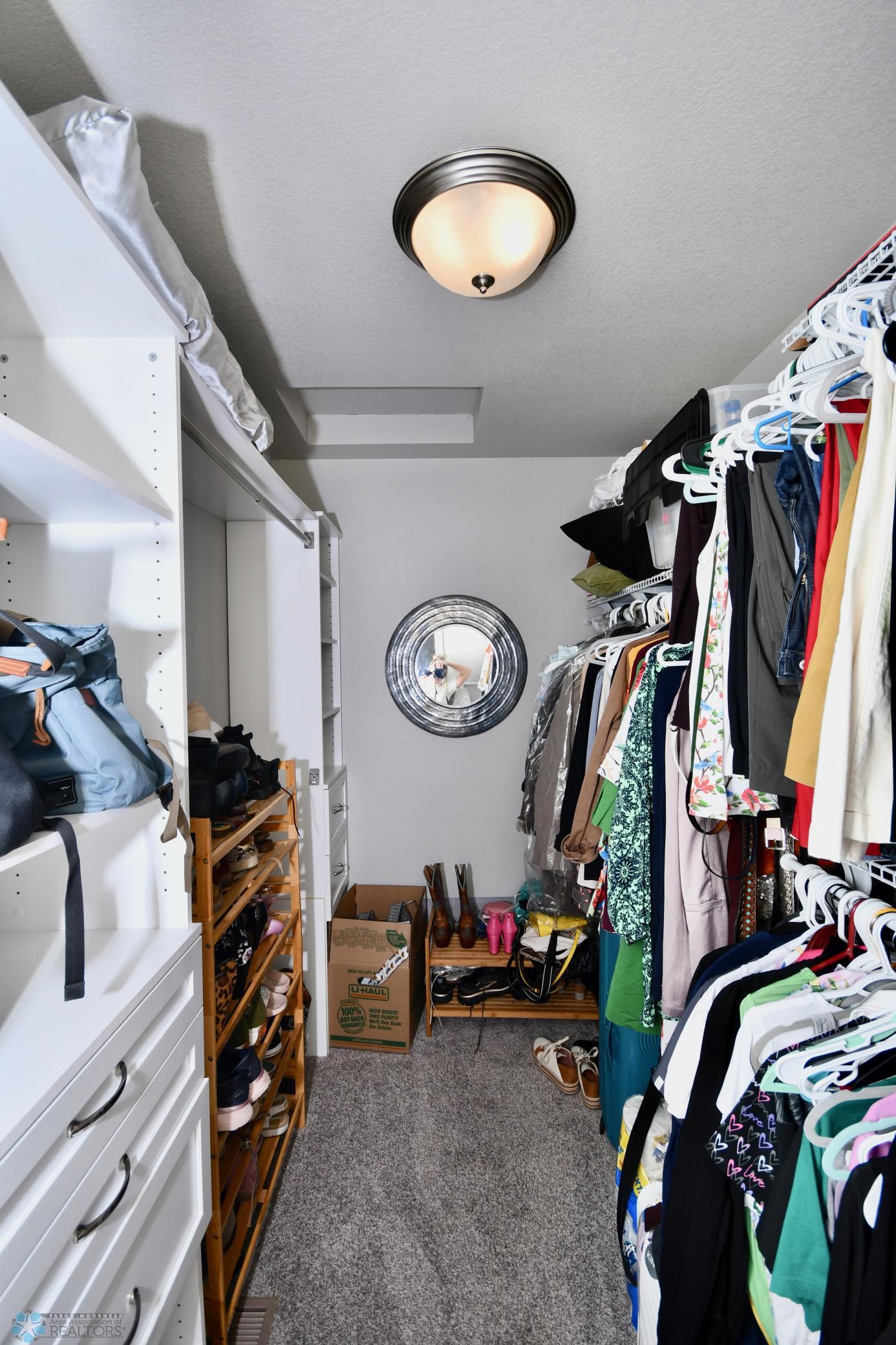 39.walk in closet with custom built ins