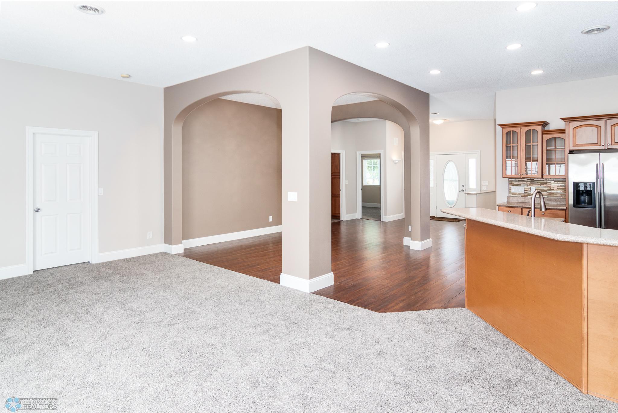 Main Living Room Facing Dining Room and Entrance