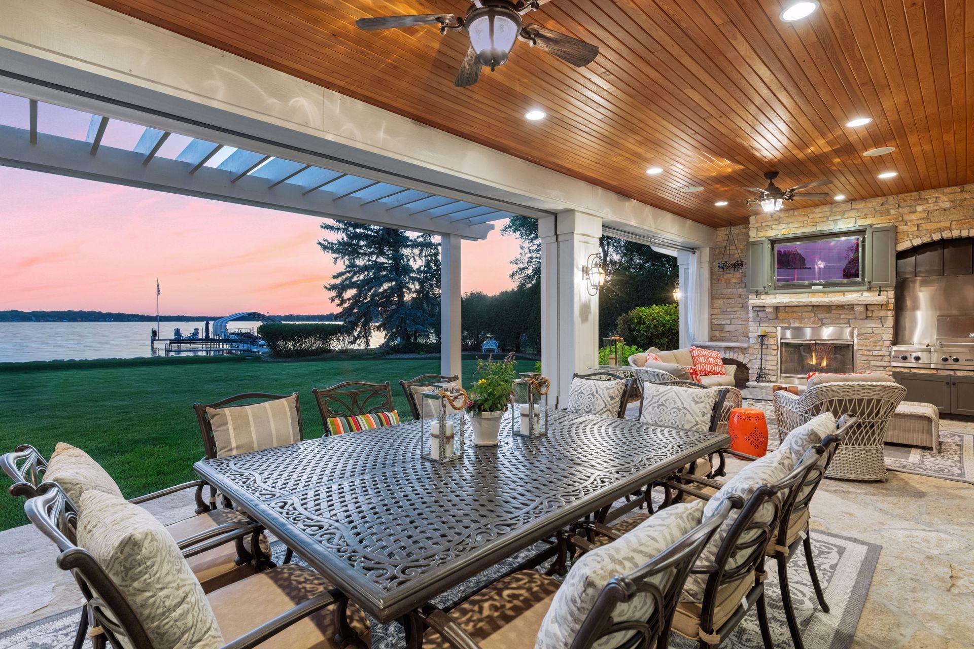 ceiling fans and cedar ceilings in covered Outdoor room