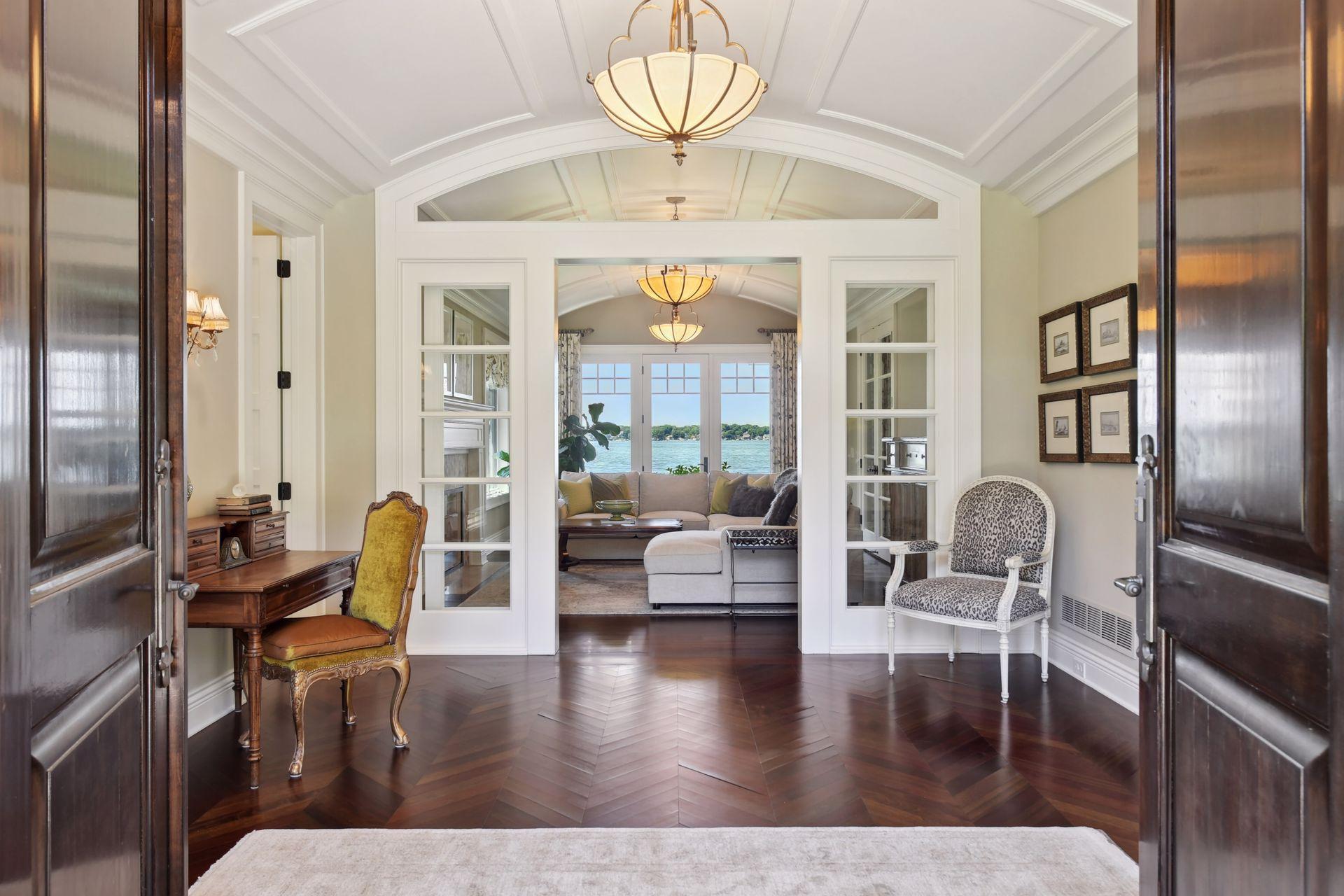 French doors lead into the hearth room