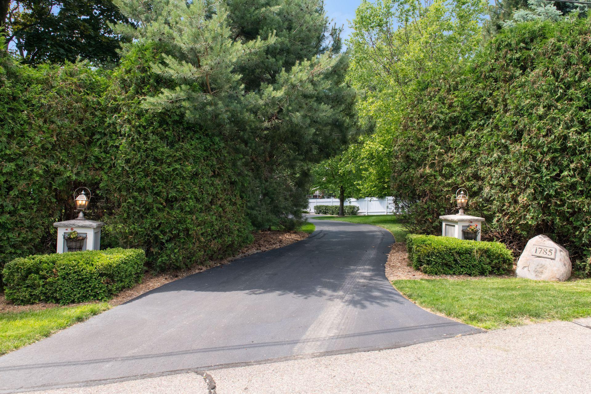 Private winding entrance to .94 acre property