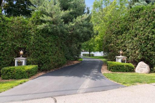 Private winding entrance to .94 acre property