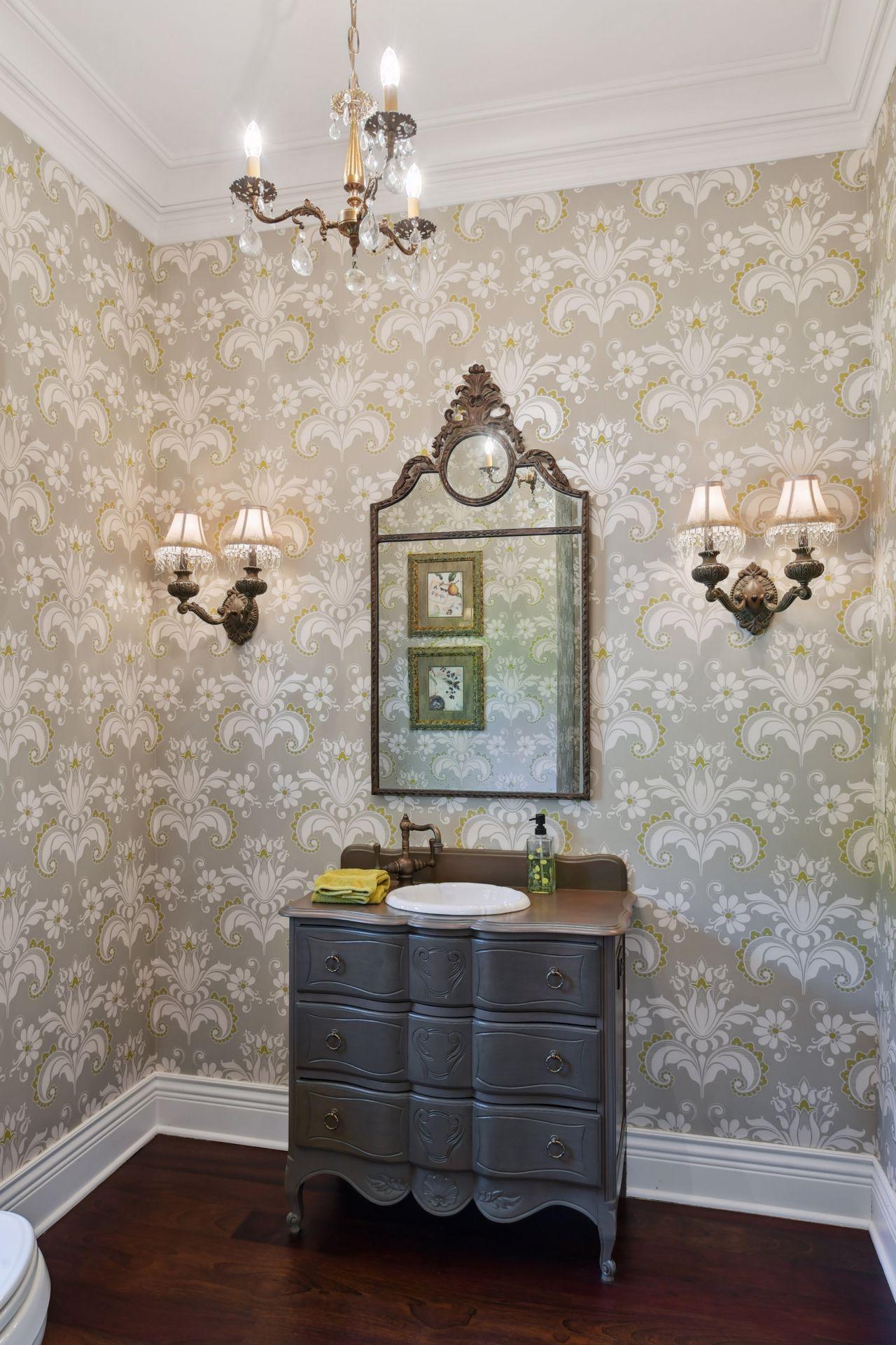 Powder room off foyer with french vanity