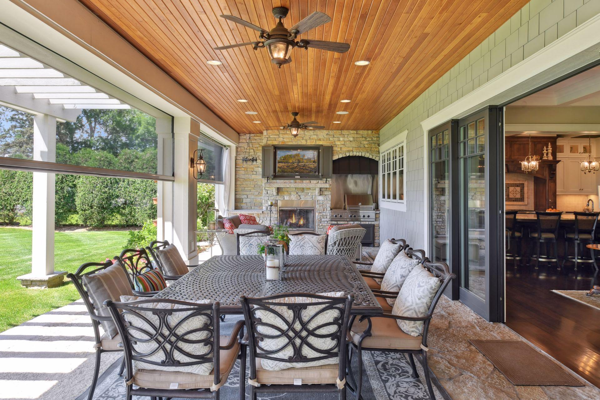 Large 50' wide outdoor room with pocket sliders brings the outside in