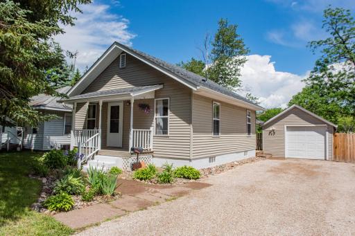 Adorable home with front porch and landscaping!.jpg