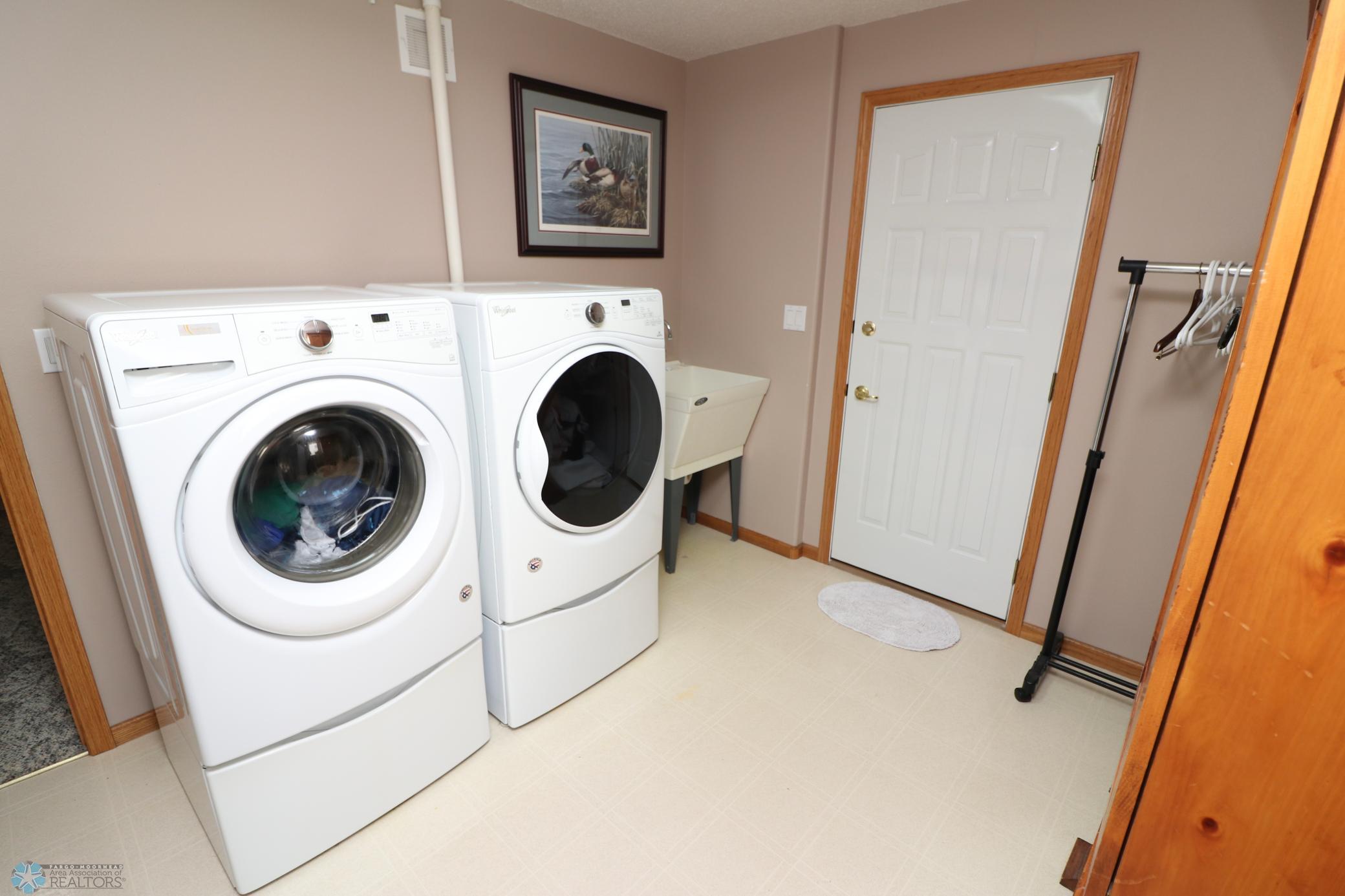 laundry with walk up to garage