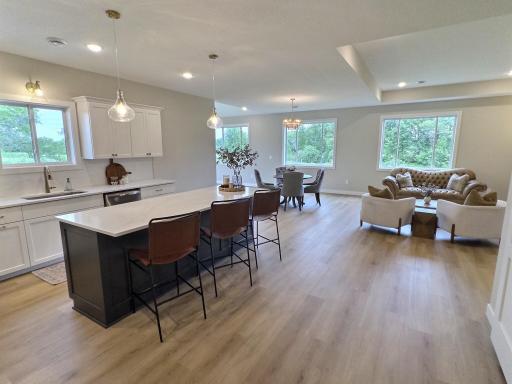 A view from the kitchen through living room area showcasing the open design that comes with patio home living.
