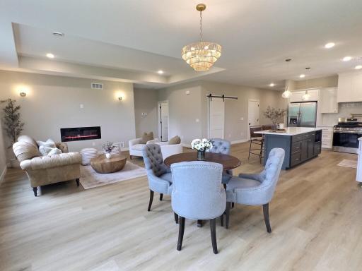 Warm and inviting living area with natural light flowing through the home. Walking through the home you will notice lot of quality finishes and upgrades.