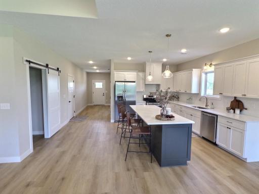 Whether entering from the garage or front entrance you will appreciate the nice wide entry area the brings you the kitchen.