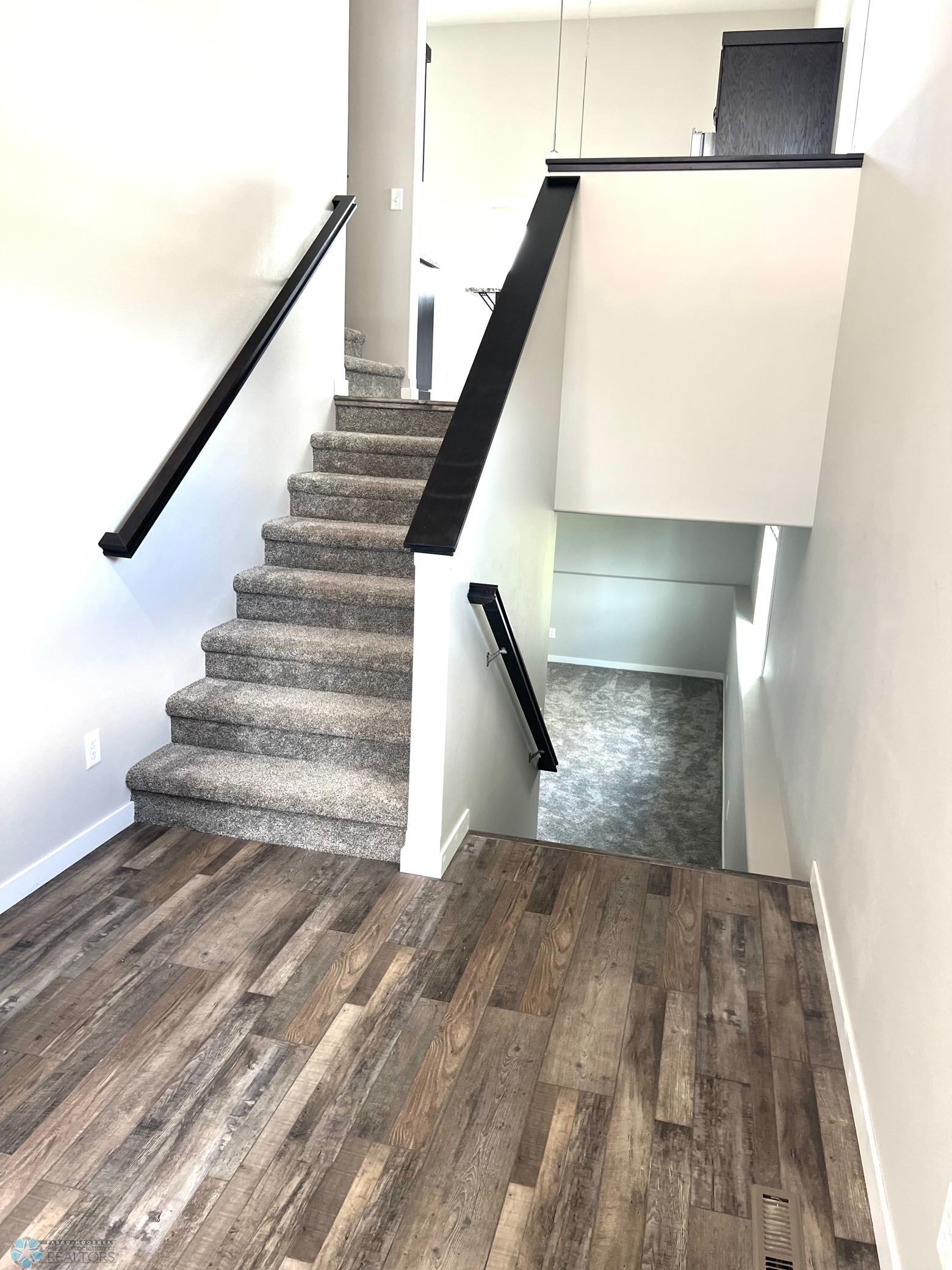 Stairs to main flower and lower level