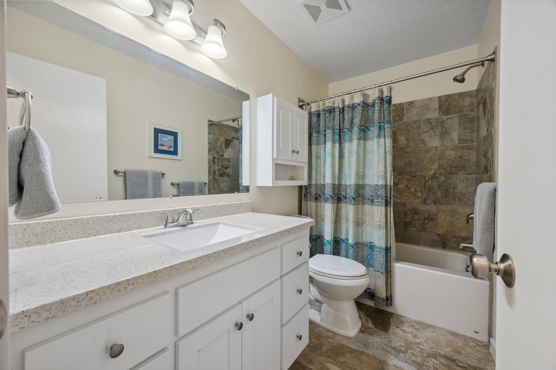 Upper bathroom with beautiful tile work