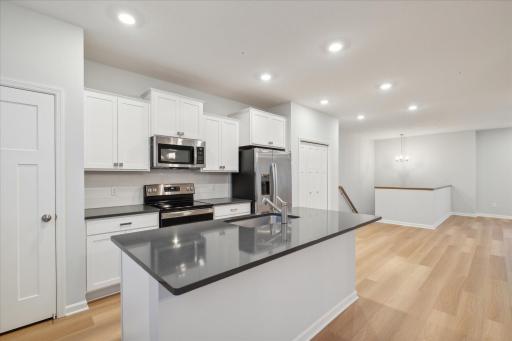 Photo of same home with similar finishes. Actual design finishes will vary.