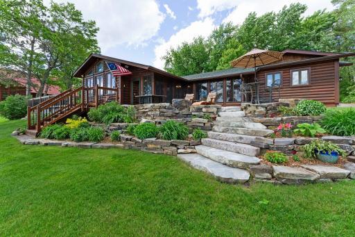 This exquisite lake shore rambler, situated on almost 1-acre of prime Upper Hay Lake property.
