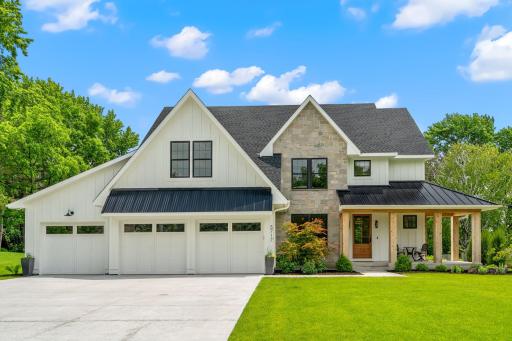 This stunning custom built home is situated on a .64 lot in Edina providing an abundance of space for all your everyday living needs.
