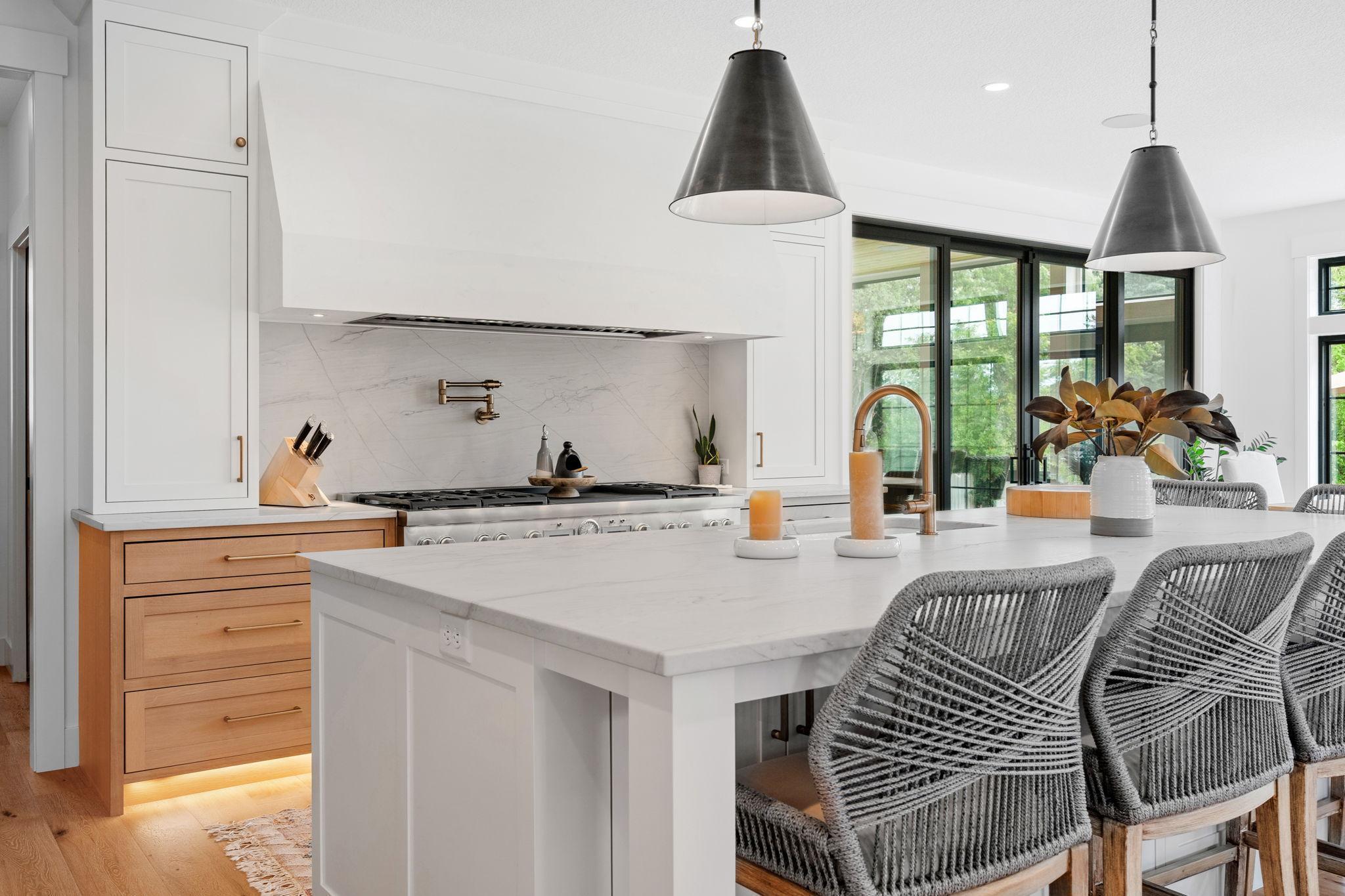 High-end Brizo pot filler and faucet add both style and practicality, making meal prep and clean-up effortless.