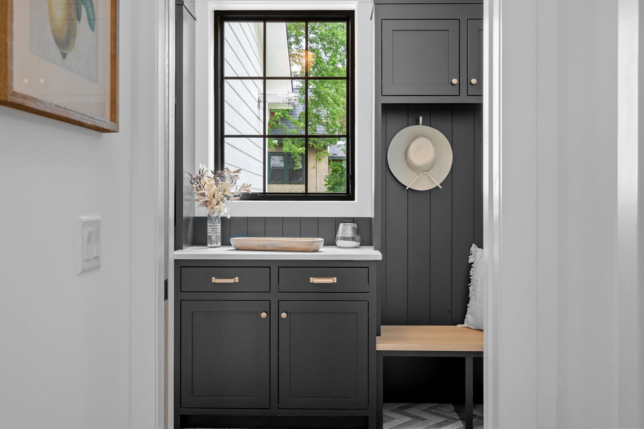 The mudroom is a perfect blend of practicality and finesse, designed to handle the demands of everyday life with ease.
