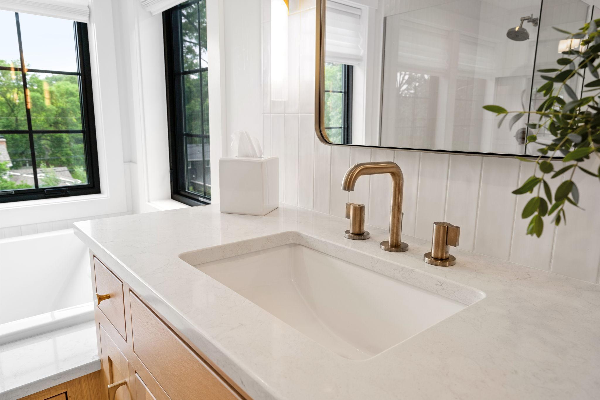 Quartz counter tops enhance the style of the all the bathrooms through out the upper level of the home.