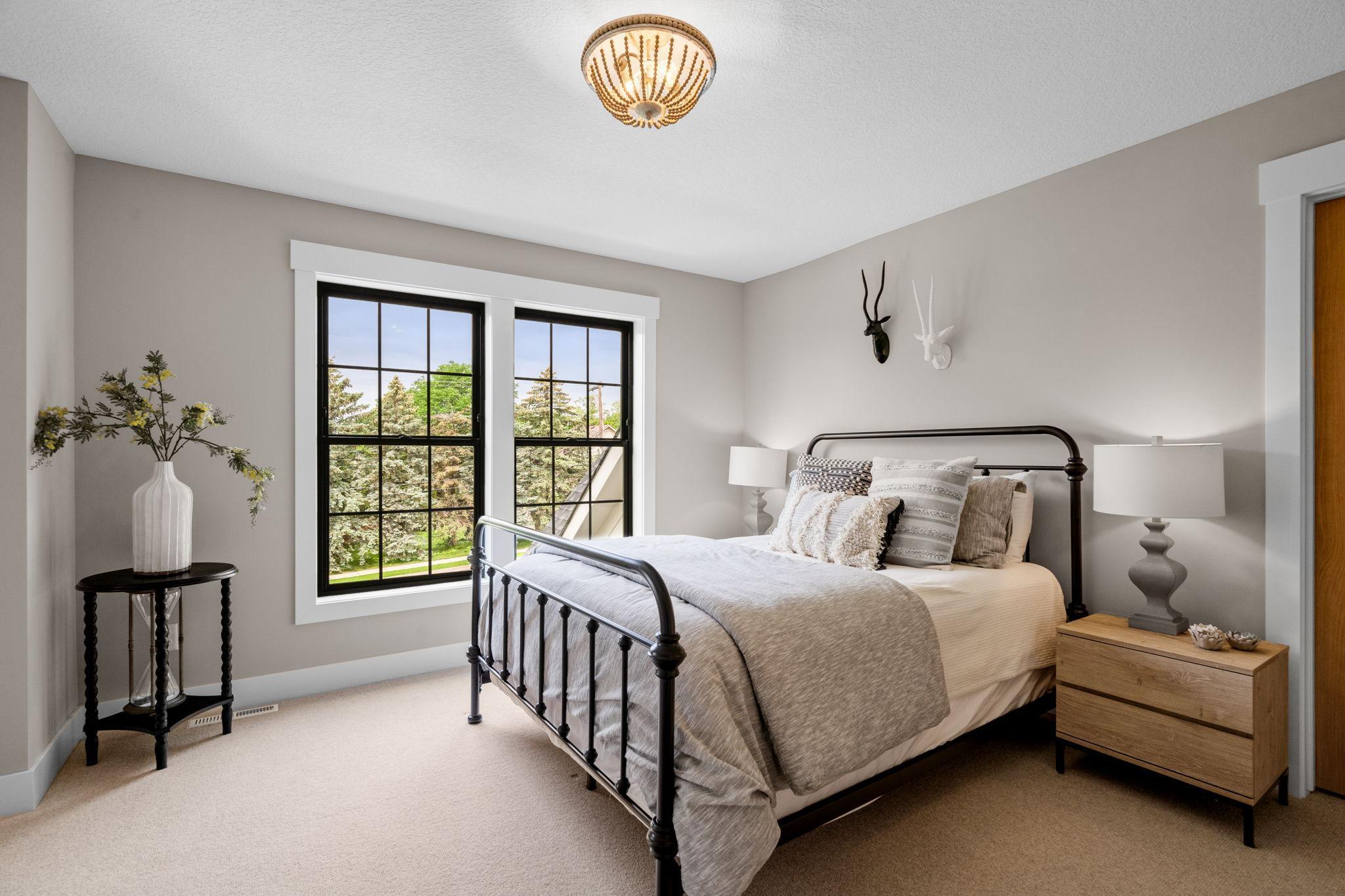 Welcome to the epitome of comfort and hospitality in this exquisite guest room, where every detail has been meticulously crafted to ensure a memorable stay for your esteemed visitors.