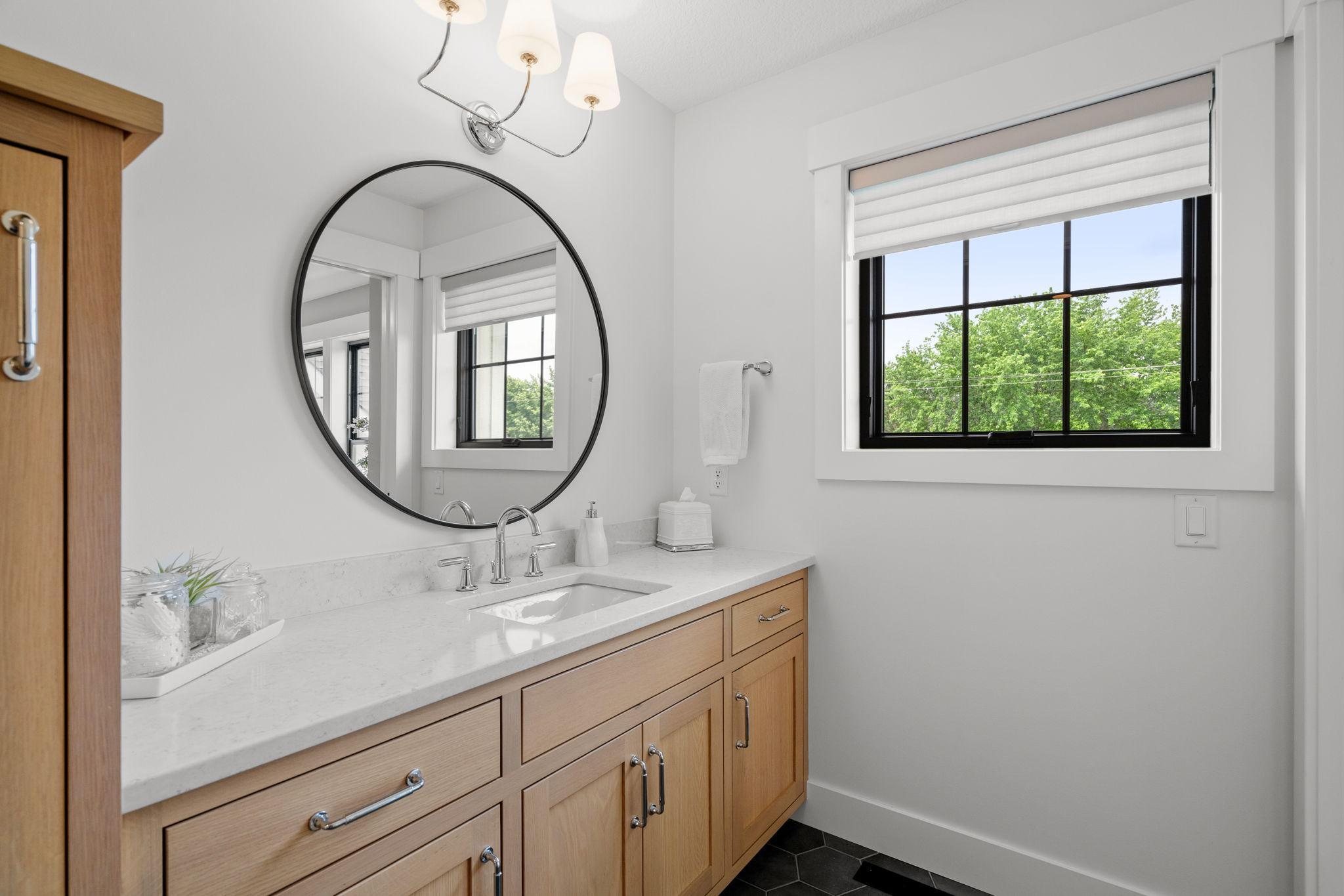 Whether hosting friends, family, or esteemed guests, this guest room with ensuite 3/4 tile shower offers a welcoming retreat that embodies the essence of hospitality.