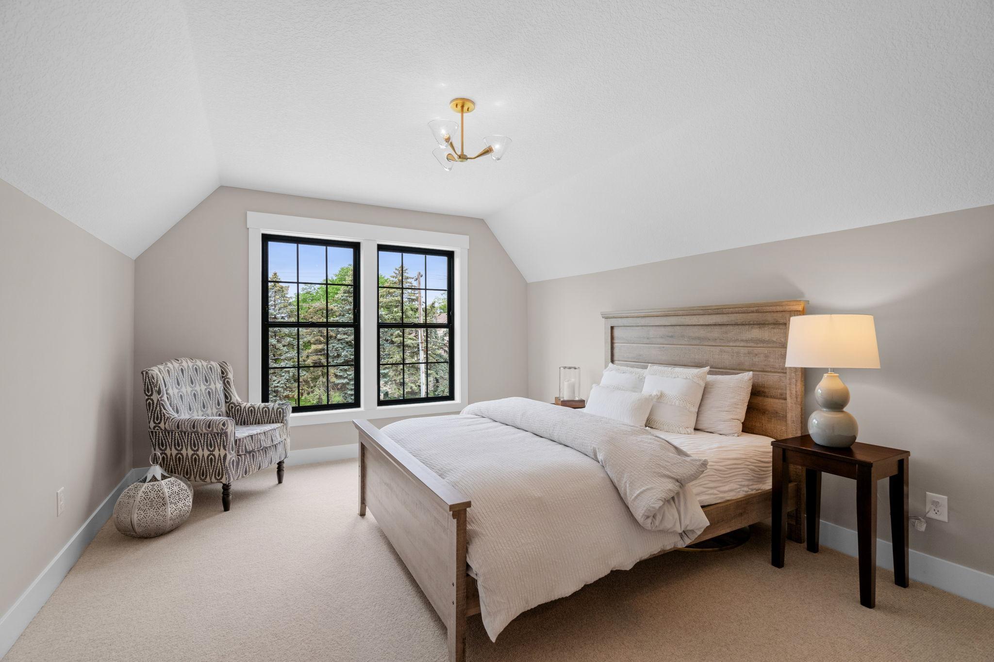 Step into a realm of sophisticated living with this exquisite arrangement of two upper bedrooms, seamlessly connected by a luxurious Jack and Jill bathroom.