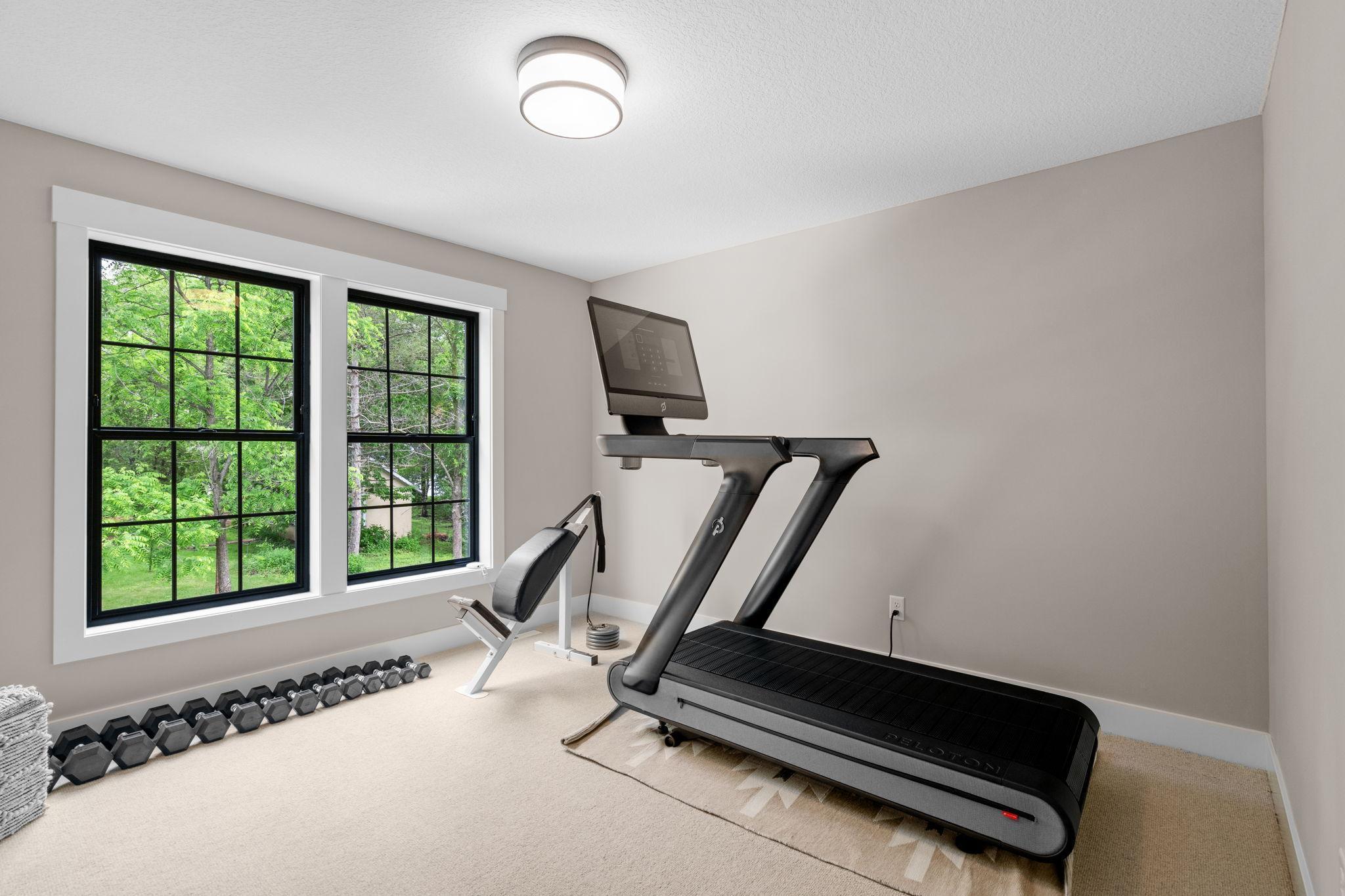 Beyond the bathroom, the second bedroom beckons with its own unique charm and allure.