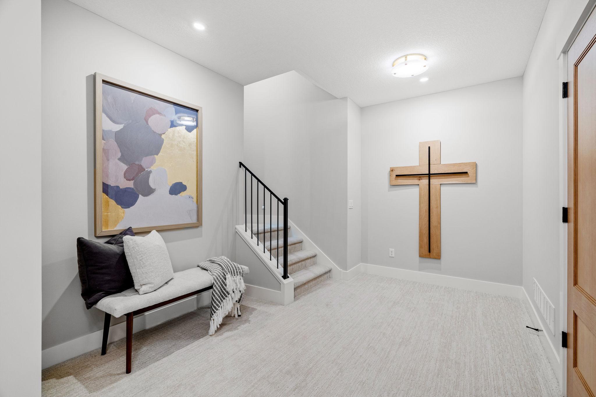 The lower level of this home is a well-appointed space designed for entertaining, featuring a range of high-end finishes and thoughtful details.