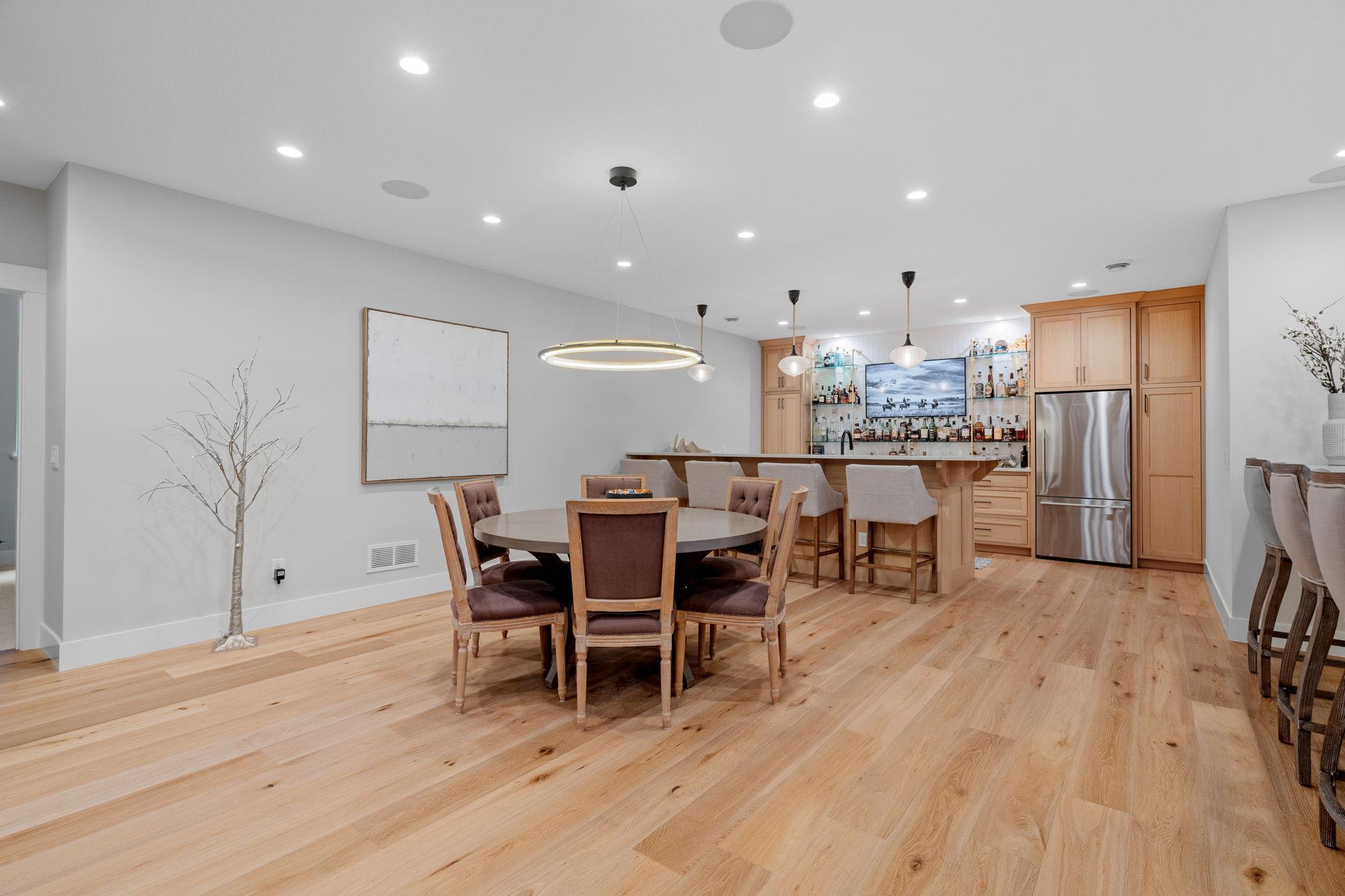 This lower level seamlessly provides a versatile and luxurious living area.