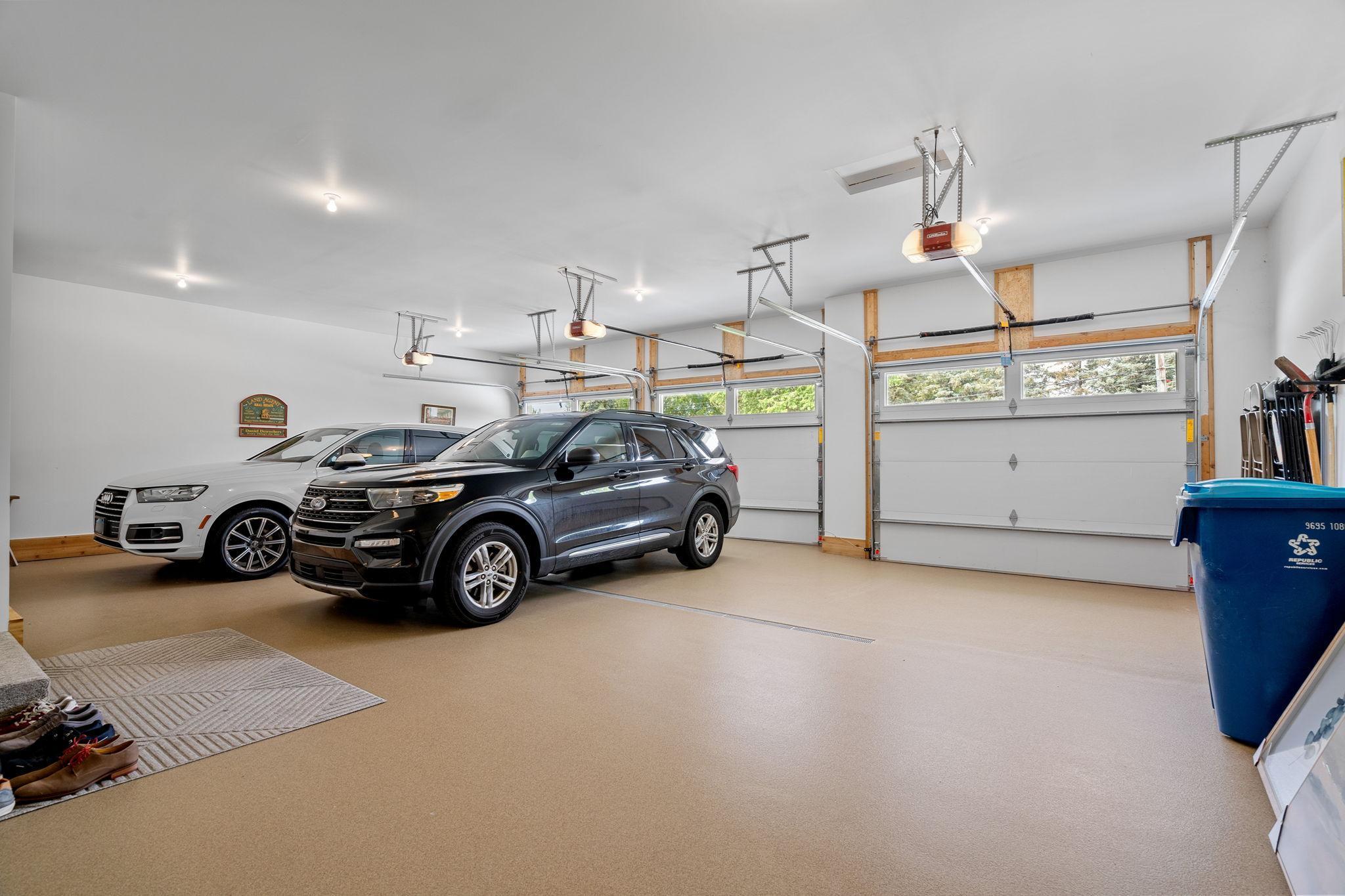 The 3-car garage is a meticulously designed space that is highly functional, making it an extension of the home. Fully finished, insulated, heated with its own thermostat and three 8x10 garage doors, this garage ensures usability year-round.