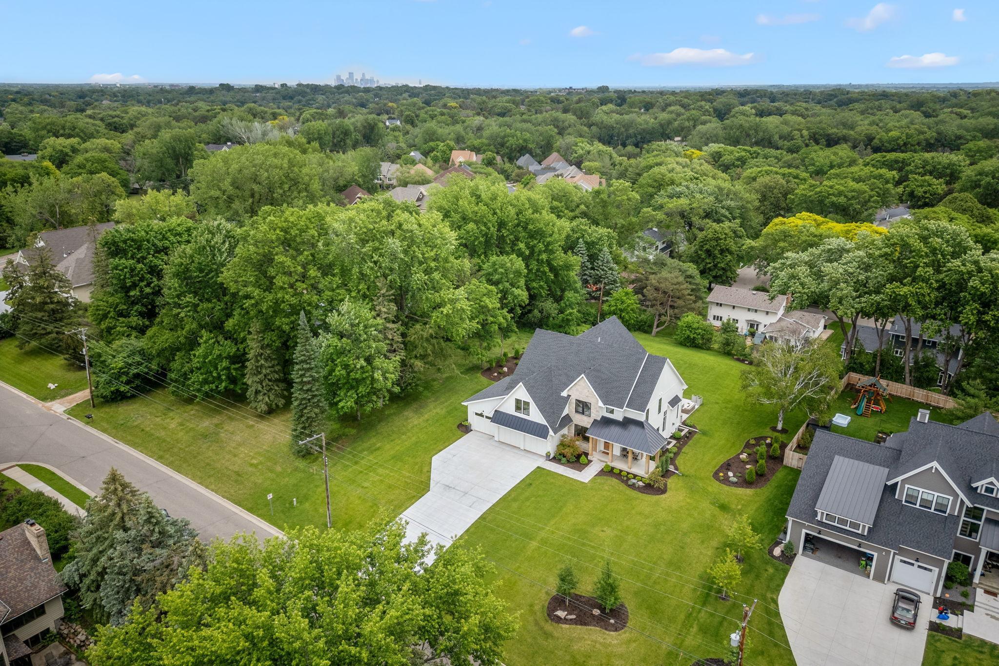 Located within walking distance to Bredesen Park, with its scenic walking trails and access to 9 Mile Creek, this home offers easy access to outdoor recreation.