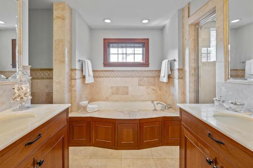 Full primary bathroom with separate shower and water closet