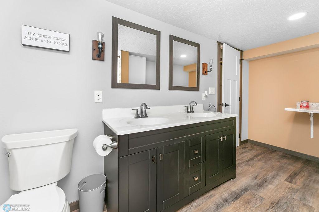 Basement Full Bathroom with Double Sinks