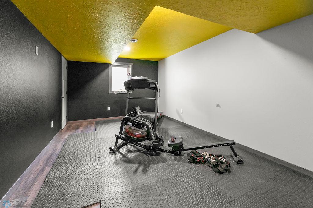 Bedroom 4 w/ Walk-in Closet (currently set up as Exercise Room)