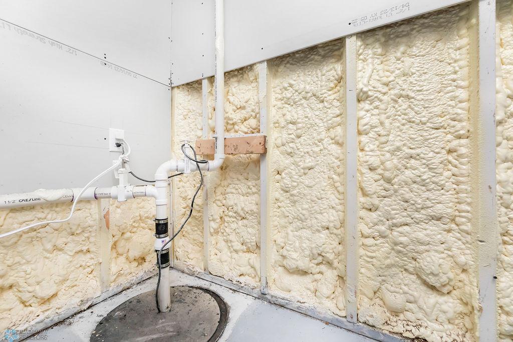 Utility Room w/ Sump Pump