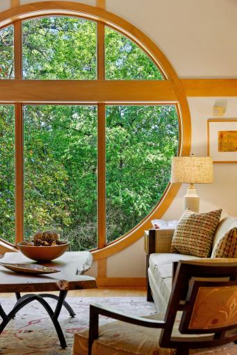 An iconic circular picture window in the main floor living room.