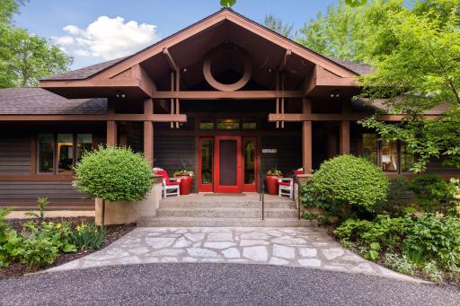 Approach this captivating home nestled on over 4.5 secluded Acres in the Heart of Prestigious Mendota Heights