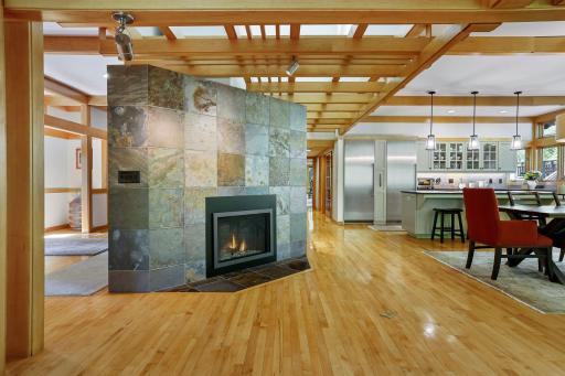 Indian slate detail compliments the natural woodwork & gleaming hardwood floors.