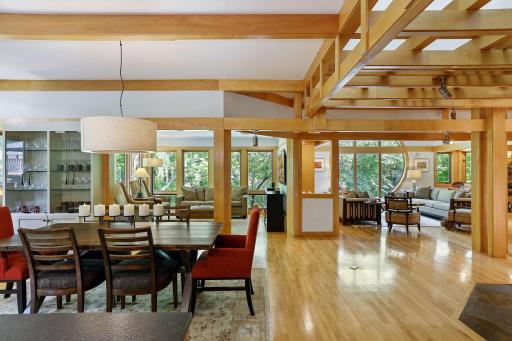 Main dining area flows to Sunroom & Living Room areas.